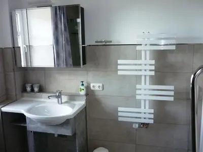 Ein Badezimmer in der Unterkunft Loogher Mühle Neubau