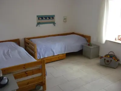 Ein Bett oder Betten in einem Zimmer der Unterkunft Loogher Mühle Neubau