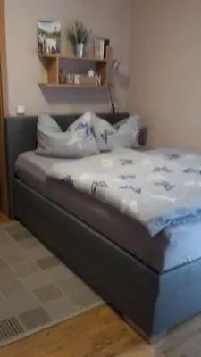 Ein Bett oder Betten in einem Zimmer der Unterkunft Marktstübchen, Einzelzimmer
