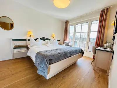 Ein Bett oder Betten in einem Zimmer der Unterkunft Hotel Zur Traube