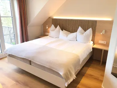 Ein Bett oder Betten in einem Zimmer der Unterkunft Hotel Zur Traube