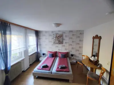 Ein Bett oder Betten in einem Zimmer der Unterkunft Mosel Restaurant & Weinstube Zum Anker