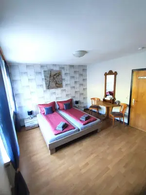 Ein Bett oder Betten in einem Zimmer der Unterkunft Mosel Restaurant & Weinstube Zum Anker
