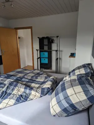 Ein Bett oder Betten in einem Zimmer der Unterkunft Pension Larifari