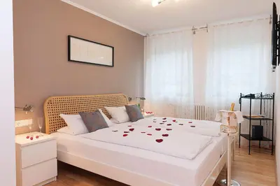 Ein Bett oder Betten in einem Zimmer der Unterkunft Merker's Hotel & Restaurant Bostalsee