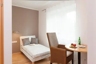 Ein Bett oder Betten in einem Zimmer der Unterkunft Merker's Hotel & Restaurant Bostalsee