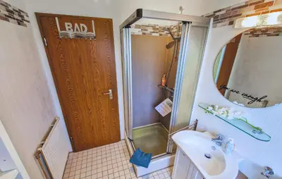 Ein Badezimmer in der Unterkunft Ferienhaus 1 In Thalfang