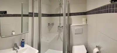Ein Badezimmer in der Unterkunft Hotel Arns