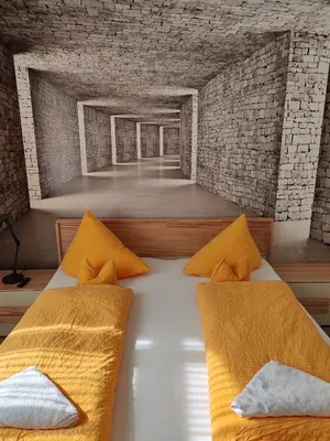 Ein Bett oder Betten in einem Zimmer der Unterkunft Hotel Arns