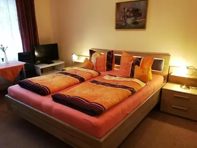 Ein Bett oder Betten in einem Zimmer der Unterkunft Hotel Arns