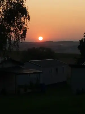 Blick auf den Sonnenuntergang/Sonnenaufgang von des Chalets aus oder aus der Nähe
