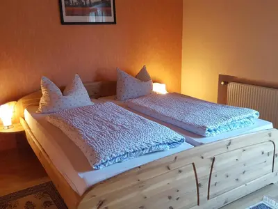 Ein Bett oder Betten in einem Zimmer der Unterkunft Pension Hermes