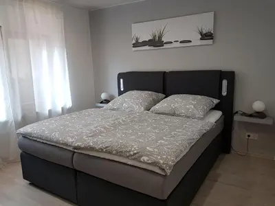 Ein Bett oder Betten in einem Zimmer der Unterkunft ELLA am Eifelsteig