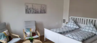 Ein Bett oder Betten in einem Zimmer der Unterkunft Apartment Hallenbach