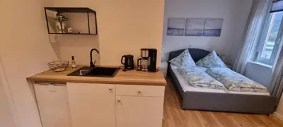 Küche/Küchenzeile in der Unterkunft Apartment Hallenbach