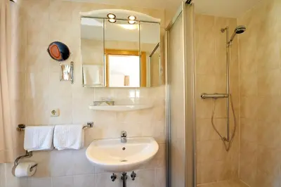 Ein Badezimmer in der Unterkunft Landhotel Krolik