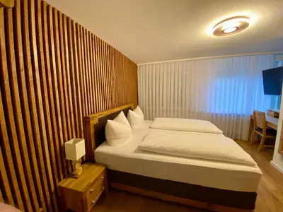 Ein Bett oder Betten in einem Zimmer der Unterkunft Hotel Restaurant Unikat