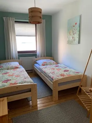 Ein Bett oder Betten in einem Zimmer der Unterkunft Am Kräutergarten