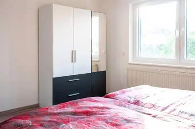 Ein Bett oder Betten in einem Zimmer der Unterkunft Haus Hanghuhn