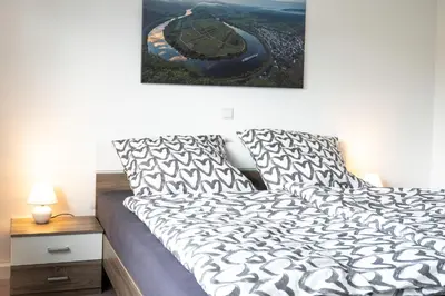Ein Bett oder Betten in einem Zimmer der Unterkunft Haus Hanghuhn