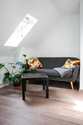 Ein Sitzbereich in der Unterkunft Haus Hanghuhn