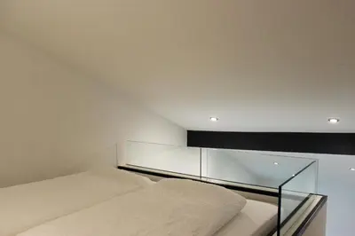 Ein Bett oder Betten in einem Zimmer der Unterkunft Ferienapartment Rebwinkel