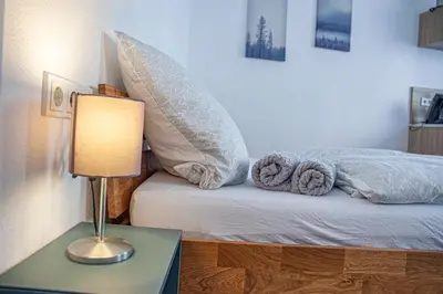Ein Bett oder Betten in einem Zimmer der Unterkunft Apartment Kabinett Zell