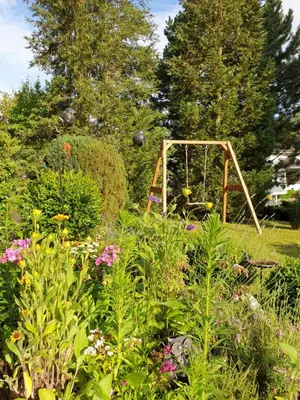 Ein Garten an der Unterkunft Ferienwohnung zur Töpferstube 1