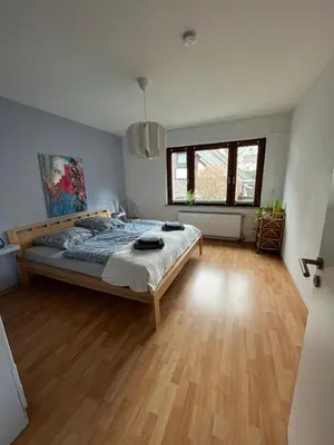 Ein Bett oder Betten in einem Zimmer der Unterkunft Am Teich