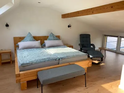 Ein Bett oder Betten in einem Zimmer der Unterkunft Ferienwohnung zum Mandelgraben