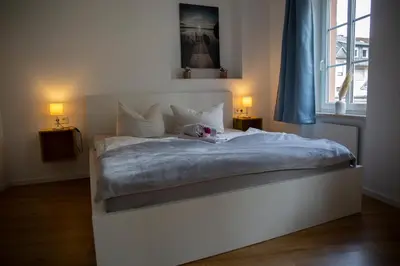 Ein Bett oder Betten in einem Zimmer der Unterkunft Suite Barrique Zell