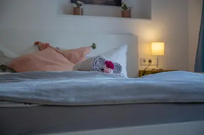 Ein Bett oder Betten in einem Zimmer der Unterkunft Suite Barrique Zell