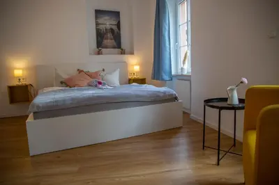 Ein Bett oder Betten in einem Zimmer der Unterkunft Suite Barrique Zell