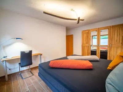 Ein Bett oder Betten in einem Zimmer der Unterkunft Rheintal-Ferien - 90 qm Ferienwohnung mit Wine & Style - Dein Urlaub am Rhein