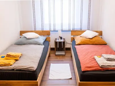 Ein Bett oder Betten in einem Zimmer der Unterkunft Rheintal-Ferien - 90 qm Ferienwohnung mit Wine & Style - Dein Urlaub am Rhein