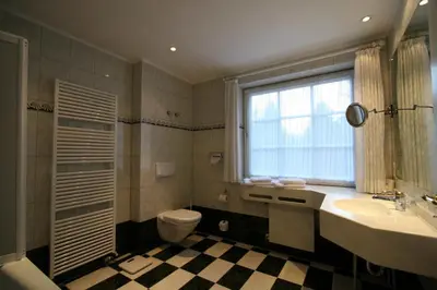 Ein Badezimmer in der Unterkunft Park Hotel am Schloss