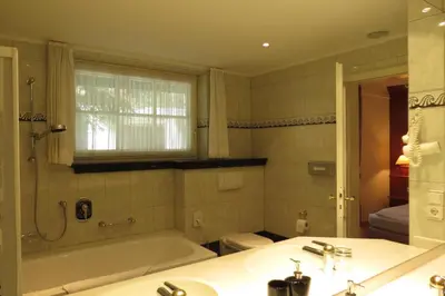 Ein Badezimmer in der Unterkunft Park Hotel am Schloss