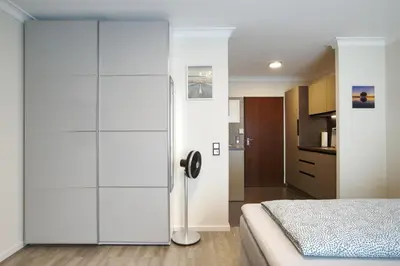 Ein Bett oder Betten in einem Zimmer der Unterkunft S.F.C. Apartments
