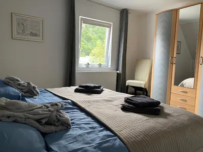 Ein Bett oder Betten in einem Zimmer der Unterkunft Ferienhaus am Baybach in Burgen an der Mosel