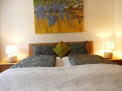 Ein Bett oder Betten in einem Zimmer der Unterkunft Katrin-Cara Mia Ferienwohnung