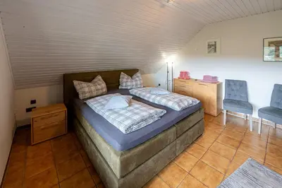 Ein Bett oder Betten in einem Zimmer der Unterkunft Haus 
