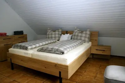 Ein Bett oder Betten in einem Zimmer der Unterkunft Haus 