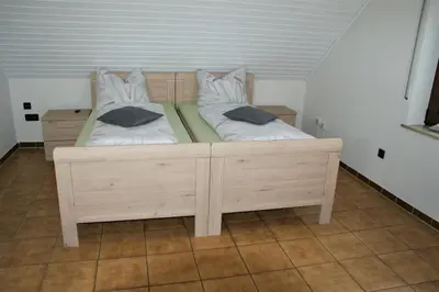 Ein Bett oder Betten in einem Zimmer der Unterkunft Haus 