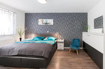 Ein Bett oder Betten in einem Zimmer der Unterkunft Kaiser-Ferienwohnungen am Rheinsteig