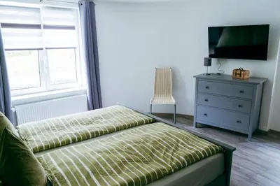 Ein Bett oder Betten in einem Zimmer der Unterkunft Ferienwohnung Klink