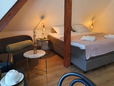 Ein Bett oder Betten in einem Zimmer der Unterkunft Boutique Hotel Villa Horbach