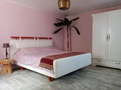 Ein Bett oder Betten in einem Zimmer der Unterkunft Ferienwohnung Sunna