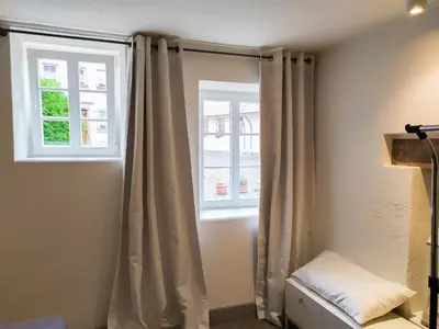 Ein Bett oder Betten in einem Zimmer der Unterkunft Living-in-History: Meister Carl Apartment