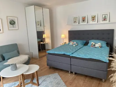 Ein Bett oder Betten in einem Zimmer der Unterkunft Ferienwohnung Nele