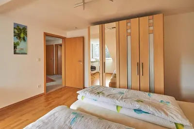 Ein Bett oder Betten in einem Zimmer der Unterkunft Ferienwohnung Sonya